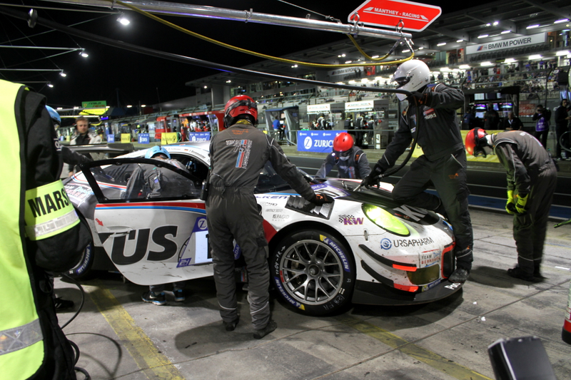 Pivoting the No. 17 Porsche 911 GT3 R out to leave the pits, all while the fueler is still on the hood.